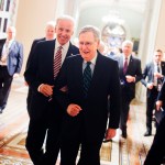 UNITED STATES - JANUARY 12: Vice President Joe Biden, left, and Senate Majority Leader Mitch McConnell, R-Ky., make their way to the House floor for President Obama's State of the Union address, January 12, 2016. (Photo By Tom Williams/CQ Roll Call)