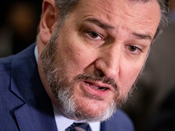 WASHINGTON, DC - JANUARY 29: Sen. Ted Cruz (R-TX) takes questions from reporters in the Senate subway during a recess in the Senate impeachment trial of President Donald Trump in the on January 29, 2020 in Washington, DC. The trial entered the phase today where senators will have the opportunity to submit written questions to the House managers and President Trump's defense team. (Photo by Samuel Corum/Getty Images) *** Local Caption *** Ted Cruz