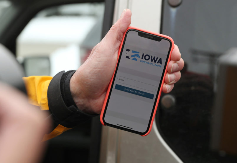 Precinct Chair Carl Voss shows the phone app he used for the Iowa Caucus to news media at the Iowa Democratic Party headquarters on February 4, 2020, in Des Moines, Iowa. (John J. Kim/Chicago Tribune/TNS)