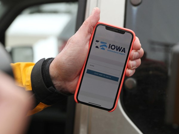 Precinct Chair Carl Voss shows the phone app he used for the Iowa Caucus to news media at the Iowa Democratic Party headquarters on February 4, 2020, in Des Moines, Iowa. (John J. Kim/Chicago Tribune/TNS)
