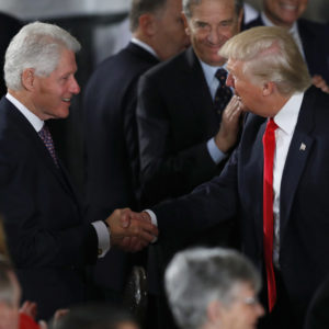 WASHINGTON, DC - JANUARY 20:  President Donald Trump greets former President Bill Clinton at the Inaugural Luncheon in the US Capitol January 20, 2017 in Washington, DC. President Trump will attend the luncheon along with other dignitaries. (Photo by Aaron P. Bernstein/Getty Images)