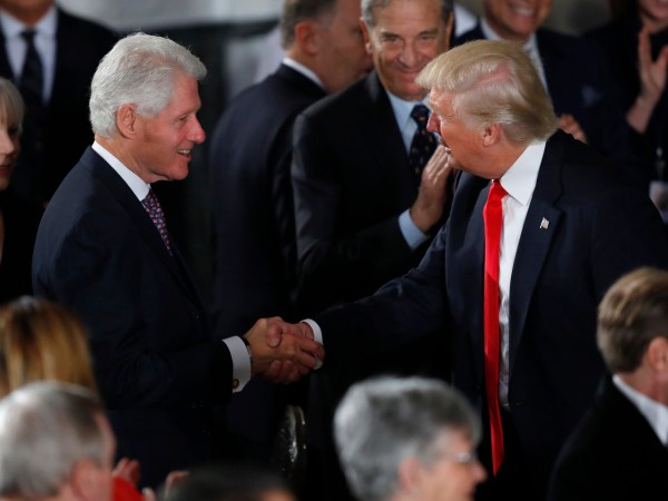 WASHINGTON, DC - JANUARY 20:  President Donald Trump greets former President Bill Clinton at the Inaugural Luncheon in the US Capitol January 20, 2017 in Washington, DC. President Trump will attend the luncheon along with other dignitaries. (Photo by Aaron P. Bernstein/Getty Images)