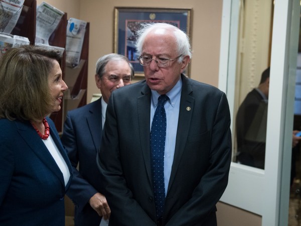 UNITED STATES - OCTOBER 04: From left, House Minority Leader Nancy Pelosi, D-Calif., Rep. John Yarmuth, D-Ky., and Sen. Bernie Sanders, I-Vt., prepare for a news conference in the Capitol to speak out against Republicans' tax and budget plan that they say will benefit the wealthy on October 4, 2017. (Photo By Tom Williams/CQ Roll Call)