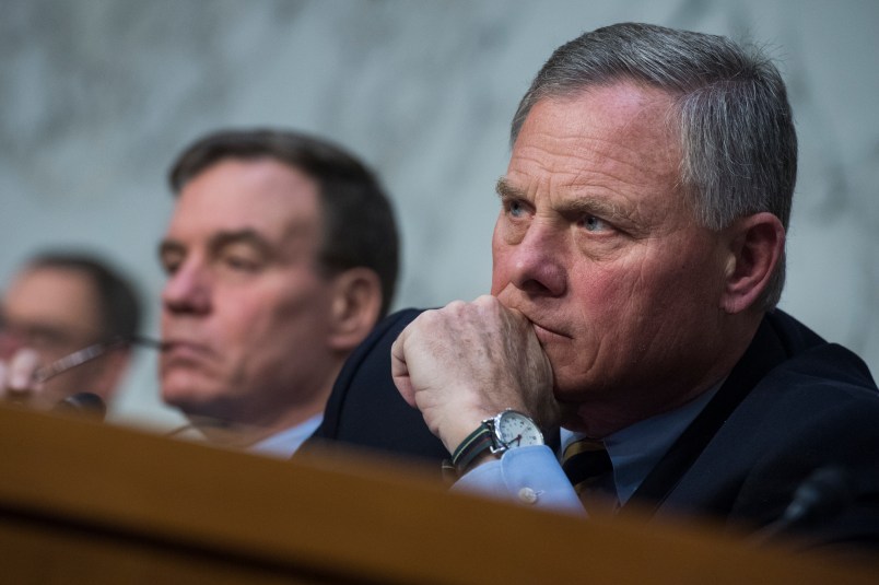 UNITED STATES - MARCH 21: Chairman Richard Burr, R-N.C., right, and ranking member Sen. Mark Warner, D-Va., conduct a Senate Intelligence Committee hearing in Hart Building on Russian Interference in the 2016 election on March 21, 2018. Homeland Security Secretary Kirstjen Nielson, and former Secretary Jeh Johnson, also testified. (Photo By Tom Williams/CQ Roll Call)