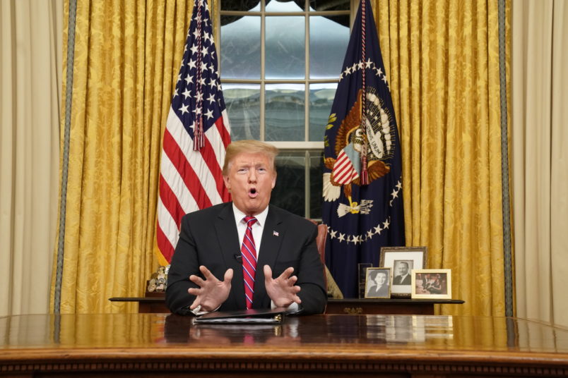 U.S. President Donald Trump delivers a televised address to the nation from his desk in the Oval Office about immigration and the southern U.S. border on the 18th day of a partial government shutdown at the White House in Washington, U.S., January 8, 2019. REUTERS/Carlos Barria