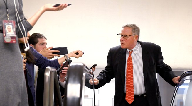 WASHINGTON, DC -JANUARY 30:Sen. Richard Burr (R-N.C.) talks with reporters as he heads to the Senate Chambers January 30, 2020 in Washington, DC. Senators spend a second day asking both the House prosecutors and President Trump's defense team questions during the Senate impeachment trial.(Photo by Katherine Frey/The Washington Post)