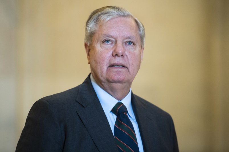 UNITED STATES - MARCH 17: Sen. Lindsey Graham, R-S.C., leaves the Senate Republican Policy luncheon in Russell Building on Tuesday, March 17, 2020. Treasury Secretary Steven Mnuchin attended to discuss the coronavirus relief package. (Photo By Tom Williams/CQ Roll Call)