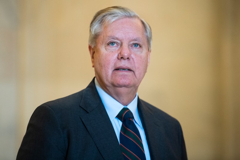 UNITED STATES - MARCH 17: Sen. Lindsey Graham, R-S.C., leaves the Senate Republican Policy luncheon in Russell Building on Tuesday, March 17, 2020. Treasury Secretary Steven Mnuchin attended to discuss the coronavirus relief package. (Photo By Tom Williams/CQ Roll Call)