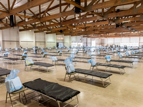 Oregon Army National Guard Soldiers assisted the Oregon Health Authority (OHA) in setting up the Oregon Medical Station (OMS) at the Oregon State Fairgrounds, March 19, 2020. The OMS is a temporary mobile facility dedicated for emergency use in situations like the COVID-19 pandemic, and will provide an alternate site for 250 patients currently in nursing home care. Once operational, the OMS will be staffed by members of the State Emergency Registry of Volunteers in Oregon (SERV-OR) and the Oregon Disaster Medical Team (ODMT).  (U.S. Army National Guard photo by Sgt. 1st Class Zachary Holden, Oregon Military Department Public Affairs Office)