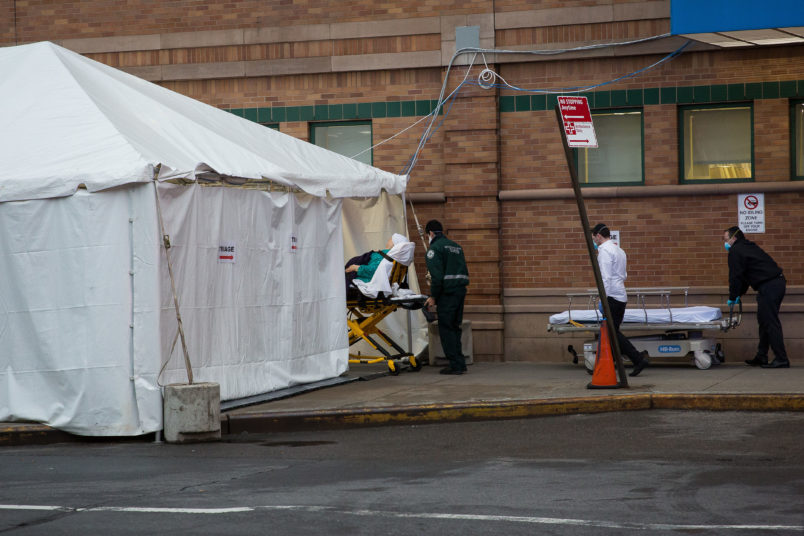 NEW YORK, March 29, 2020 -- A patient is transferred to Maimonides Medical Center in Brooklyn of New York, the United States, March 28, 2020. The confirmed cases in the United States have exceeded 122,000 as of Saturday night, up from about 101,600 of the previous day, with reports of more than 2,000 deaths, according to the tally from Johns Hopkins University's Center for Systems Science and Engineering. (Photo by Michael Nagle/Xinhua via Getty)