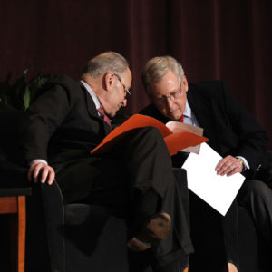 LOUISVILLE, KY-FEBRUARY 12: U.S. Senate Majority Leader Mitch McConnell (right) (R-KY) and U.S. Senate Democratic Leader Chuck Schumer (D-NY) wait the stage together at the University of Louisville's McConnell Center where Schumer was scheduled to speak February 12, 2018 in Louisville, Kentucky. Sen. Schumer spoke at the event as part of the Center's Distinguished Speaker Series, and Sen. McConnell introduced him. (Bill Pugliano/Getty Images)