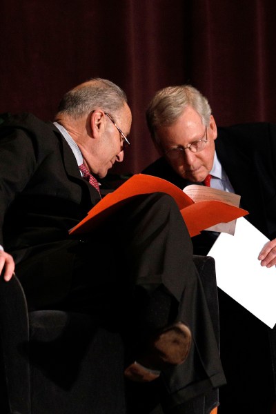LOUISVILLE, KY-FEBRUARY 12: U.S. Senate Majority Leader Mitch McConnell (right) (R-KY) and U.S. Senate Democratic Leader Chuck Schumer (D-NY) wait the stage together at the University of Louisville's McConnell Center where Schumer was scheduled to speak February 12, 2018 in Louisville, Kentucky. Sen. Schumer spoke at the event as part of the Center's Distinguished Speaker Series, and Sen. McConnell introduced him. (Bill Pugliano/Getty Images)