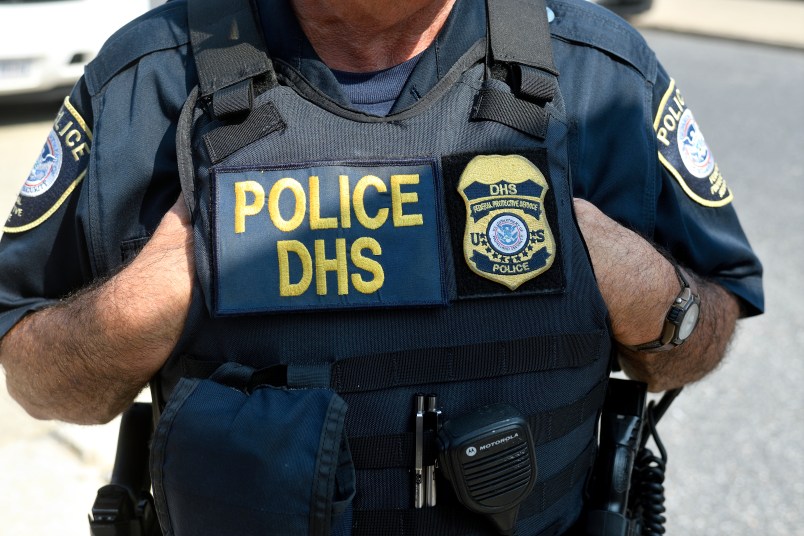 Law enforcement officers of the Philadelphia Police Department, Homeland Security and National Park Service stands by as protestors build a small encampment outside a Department of Homeland Security U.S. Immigrations and Custom Enforcement (ICE) office in Center City Philadelphia, PA, on July 3, 2018. (Photo by Bastiaan Slabbers/NurPhoto)