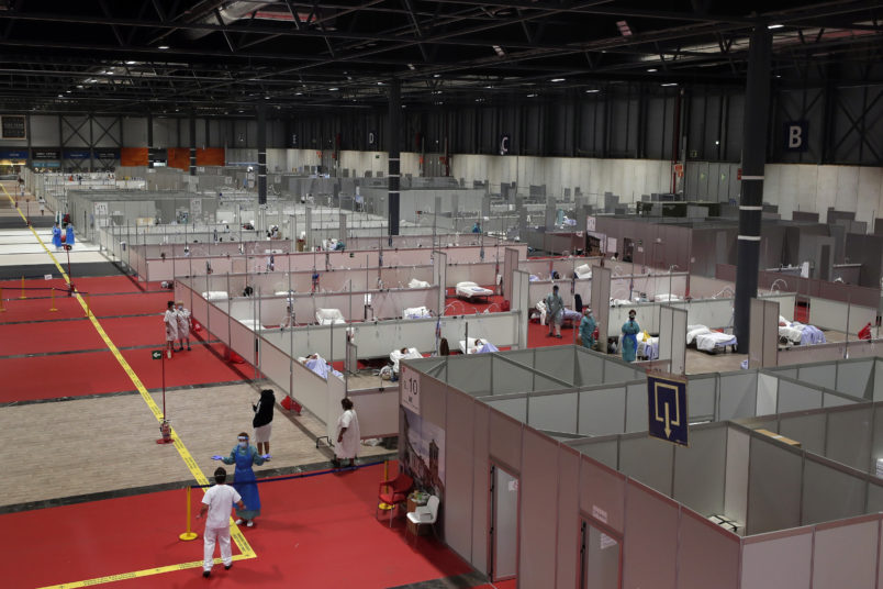A general view a temporary field hospital set at Ifema convention and exhibition of in Madrid, Spain, Thursday, April 2, 2020. The new coronavirus causes mild or moderate symptoms for most people, but for some, especially older adults and people with existing health problems, it can cause more severe illness or death. (AP Photo/Manu Fernandez)