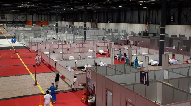 A general view a temporary field hospital set at Ifema convention and exhibition of in Madrid, Spain, Thursday, April 2, 2020. The new coronavirus causes mild or moderate symptoms for most people, but for some, especially older adults and people with existing health problems, it can cause more severe illness or death. (AP Photo/Manu Fernandez)