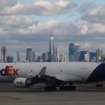 NEWARK, NJ - OCTOBER 13: A FedEx airplane makes its way to a runway in front of the skykine of New York City at Newark Liberty Airport on October 13, 2018 in Newark, New Jersey. (Photo by Gary Hershorn/Getty Images)