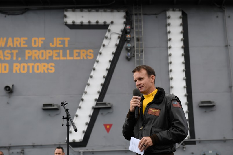191115-N-IW125-1033 PACIFIC OCEAN (Nov. 14, 2019) Capt. Brett Crozier, commanding officer of the aircraft carrier USS Theodore Roosevelt (CVN 71), addresses the crew during an all-hands call on the ship’s flight deck. Theodore Roosevelt is conducting routine operations in the Eastern Pacific Ocean. (U.S. Navy photo by Mass Communication Specialist 3rd Class Nicholas Huynh)