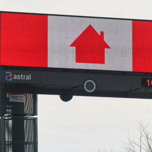 Sign with a Canadian flag (the maple leaf has been replaced with the symbol of a house) urging Canadians to stay at home to slow the spread of the novel coronavirus (COVID-19)in Vaughan, Ontario, Canada on April 12, 2020. The Ontario provincial government extended the state of emergency until April 23 due to the COVID-19 outbreak on Saturday. (Photo by Creative Touch Imaging Ltd./NurPhoto)