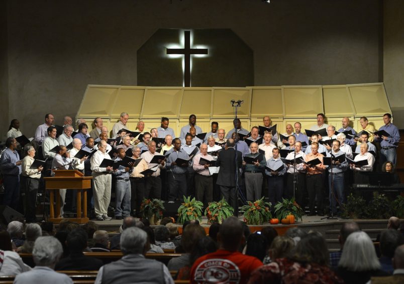 The East Hill Singers, inmates from the minimum security east unit of the Lansing Correctional Facility and volunteers from the community, perform a concert for the public at the Open Door Baptist Church in Kansas City, Kan., Nov. 17, 2013. (Jill Toyoshiba/Kansas City Star/MCT)