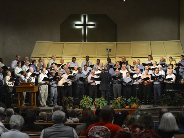 The East Hill Singers, inmates from the minimum security east unit of the Lansing Correctional Facility and volunteers from the community, perform a concert for the public at the Open Door Baptist Church in Kansas City, Kan., Nov. 17, 2013. (Jill Toyoshiba/Kansas City Star/MCT)