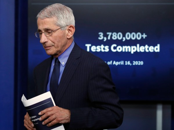 Dr. Anthony Fauci, director of the National Institute of Allergy and Infectious Diseases, walks from the podium after speaking about the coronavirus in the James Brady Press Briefing Room of the White House, Friday, April 17, 2020, in Washington. (AP Photo/Alex Brandon)