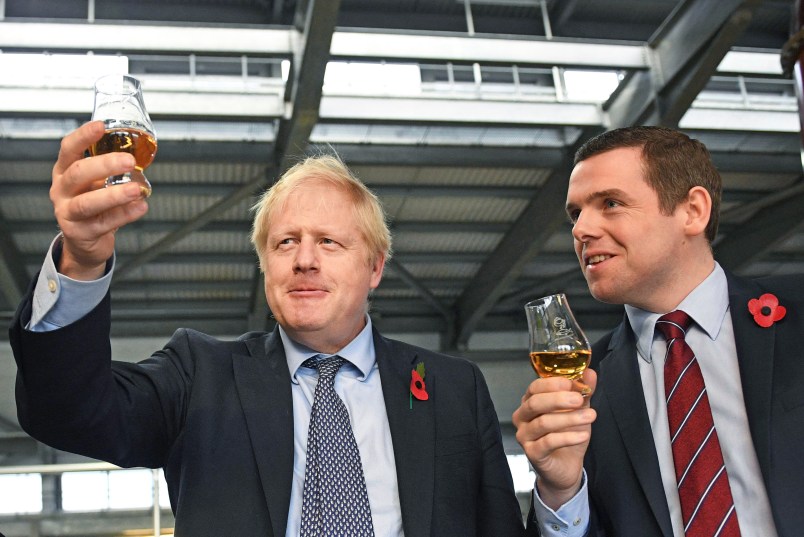 File photo dated 07/11/19 of Prime Minister Boris Johnson (left) alongside Douglas Ross, parliamentary under-secretary of state for Scotland, who has resigned from the Government over Dominic Cummings' alleged breach of lockdown rules. PA Photo. Issue date: Tuesday May 26, 2020. See PA story HEALTH Coronavirus. Photo credit should read: Stefan Rousseau/PA Wire