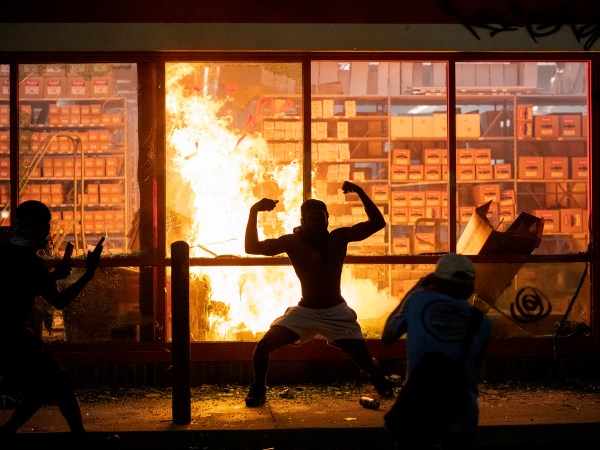 A fire was started at AutoZone. ] CARLOS GONZALEZ • cgonzalez@startribune.com – Minneapolis, MN – May 27, 2020, Police Protest - man died after a confrontation with Minneapolis on Monday evening. A bystander video that started circulating sometime after the incident appeared to show the man pleading with officers that he couldn't breathe - George Floyd