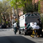 NEW YORK, UNITED STATES - APRIL 24, 2020: Two medical workers transport an elderly man from the Cobble Hill nursing home in Brooklyn to a nearby hospital amid the coronavirus crisis.As the US surpasses 50,000 confirmed coronavirus deaths, New York State’s antibody tests suggest that 14.9% of new yorkers are positive for Covid-19.