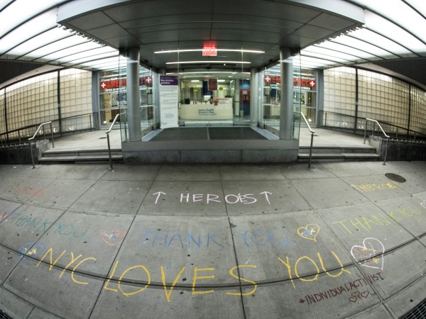 NEW YORK, NY - March 30:  MANDATORY CREDIT Bill Tompkins/Getty Images Emergency Room entrance with sidewalk grafitti that reads HEROS due to the coronavirus COVID-19 pandemic on March 30, 2020 in New York City. (Photo by Bill Tompkins/Getty Images)