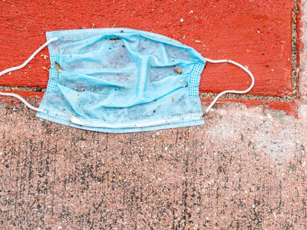 Florida, Miami Beach, North Beach, coronavirus Covid-19 pandemic crisis, discarded face mask, litter sidewalk,