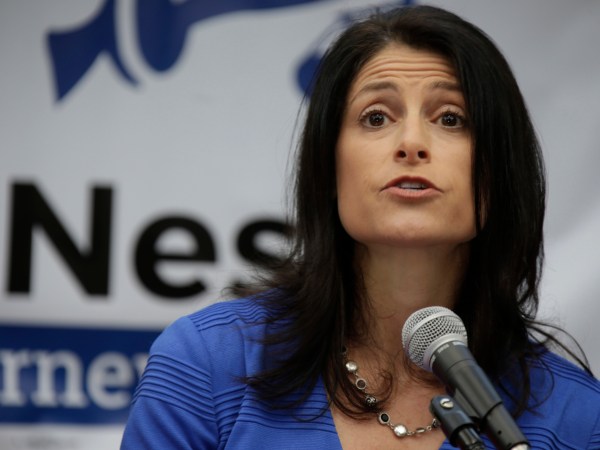 Attorney Dana Nessel, surrounded by her family, announces her bid for Michigan Attorney General in Braun Court Ann Arbor on Tuesday, Aug. 15, 2017. (Mandi Wright/Detroit Free Press/TNS)
