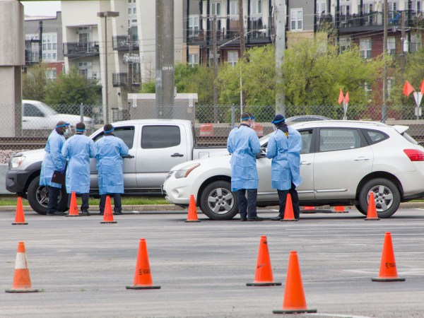 DALLAS, March 22, 2020 . Staff work at a drive-through COVID-19 testing site in Dallas, Texas, the United States, March 21, 2020. The number of COVID-19 cases in the United States topped 20,000 as of 1:30 p.m. Eastern Standard Time on Saturday ,1730 GMT, according to the Center for Systems Science and Engineering ,CSSE, at Johns Hopkins University. (Photo by Dan Tian/Xinhua via Getty)