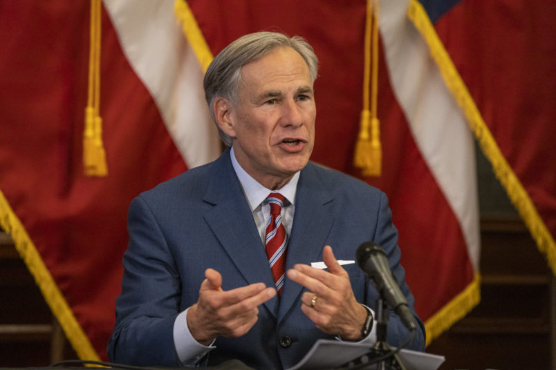 Texas Governor Greg Abbott announces the reopening of more Texas businesses during the COVID-19 pandemic at a press conference at the Texas State Capitol in Austin on Monday, May 18, 2020. Abbott said that childcare facilities, youth camps, some professional sports, and bars may now begin to fully or partially reopen their facilities as outlined by regulations listed on the Open Texas website. (Lynda M. Gonzalez/The Dallas Morning News Pool)