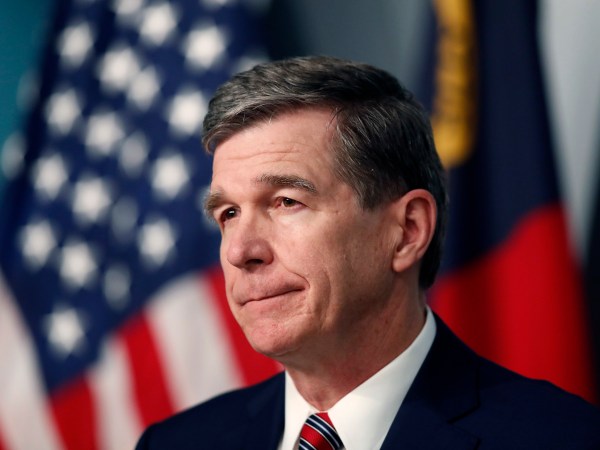North Carolina Gov. Roy Cooper listens to a question during a briefing on the coronavirus pandemic at the Emergency Operations Center in Raleigh, N.C., Tuesday, May 26, 2020. (Ethan Hyman/Raleigh News & Observer/TNS)