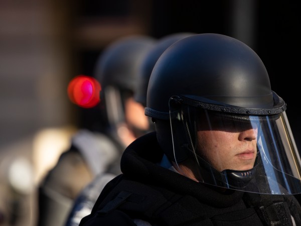 LOUISVILLE, KY - MAY 30:  Police officers in riot gear mobilize towards the park where protestors were gathered at on May 30, 2020 in Louisville, Kentucky. Protests have erupted after recent police-related incidents resulting in the deaths of African-Americans Breonna Taylor in Louisville and George Floyd in Minneapolis, Minnesota. (Photo by Brett Carlsen/Getty Images)