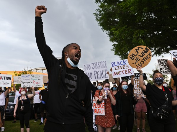 Erick Valerio, of Ronkonkoma, shouts before protestors walk down Old Country Road from Westbury towards Garden City in the death of George Floyd, Saturday, June 6, 2020.