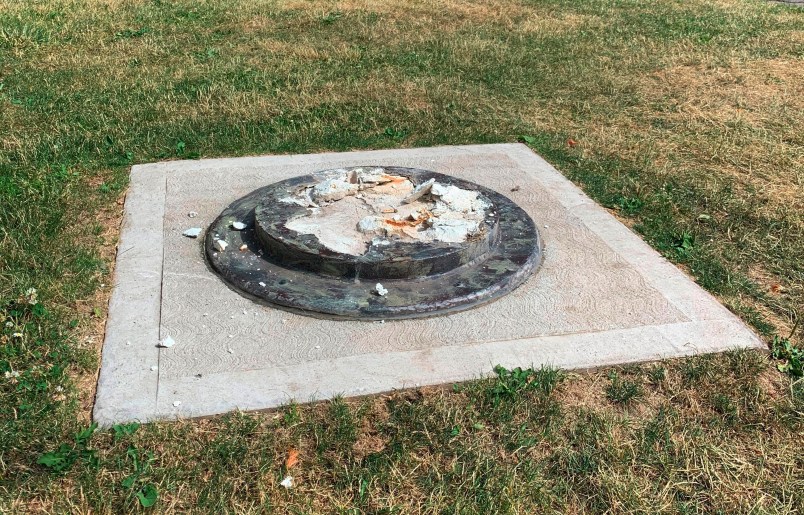 This photo provided by WROC-TV shows the remnants of a Frederick Douglass statue ripped from its base at a park in Rochester, N.Y., Sunday, July 5, 2020. The statue of abolitionist Douglass was ripped on the anniversary of one of his most famous speeches, delivered in that city in 1852. (Ben Densieski/WROC-TV)
