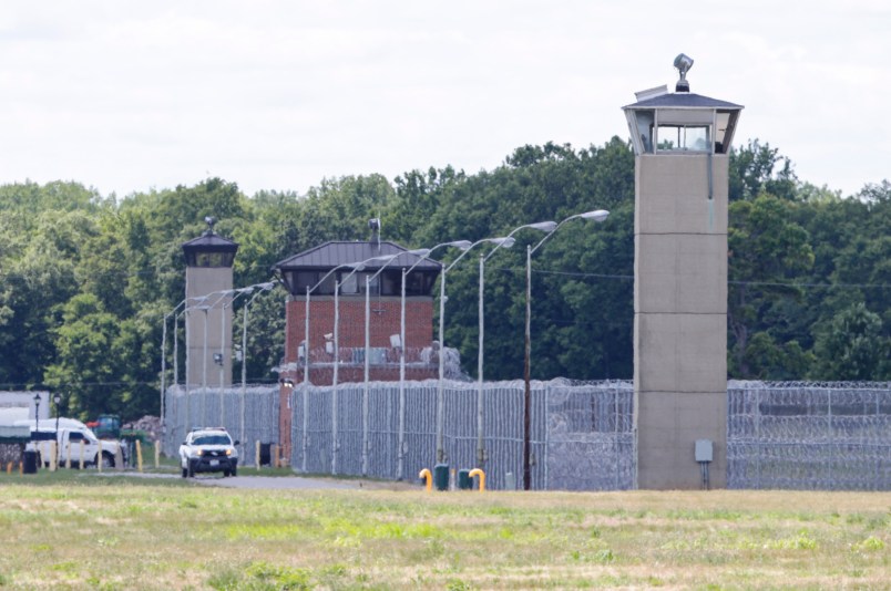 Office patrol the grounds of the federal prison in Terre Haute, Ind., is shown Monday, July 13, 2020. Daniel Lewis Lee, a convicted killer, was scheduled to be executed at 4 p.m. in the . He was convicted in Arkansas of the 1996 killings of gun dealer William Mueller, his wife, Nancy, and her 8-year-old daughter, Sarah Powell. (AP Photo/Michael Conroy)