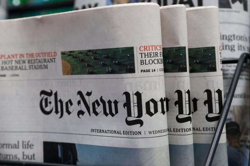 The New York Times newspaper are displayed for sale at a news stand in Hong Kong, Wednesday, July 15, 2020. The New York Times said Tuesday it will transfer some of its staff out of Hong Kong because of the uncertainties about practicing journalism in the Chinese territory under its newly imposed national security law. (AP Photo/Kin Cheung)