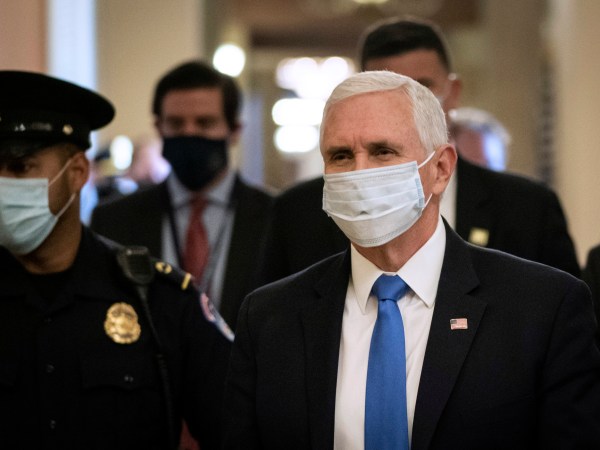 WASHINGTON, DC - MAY 18: Vice President Mike Pence wears a mask as he departs the office of Senate Majority Leader Mitch McConnell after meeting with him at the U.S. Capitol on May 18, 2020 in Washington, DC. President Trump is scheduled to attend a luncheon this afternoon with Senate Republicans. (Photo by Drew Angerer/Getty Images)