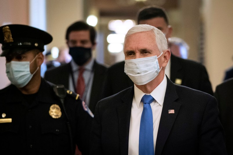 WASHINGTON, DC - MAY 18: Vice President Mike Pence wears a mask as he departs the office of Senate Majority Leader Mitch McConnell after meeting with him at the U.S. Capitol on May 18, 2020 in Washington, DC. President Trump is scheduled to attend a luncheon this afternoon with Senate Republicans. (Photo by Drew Angerer/Getty Images)
