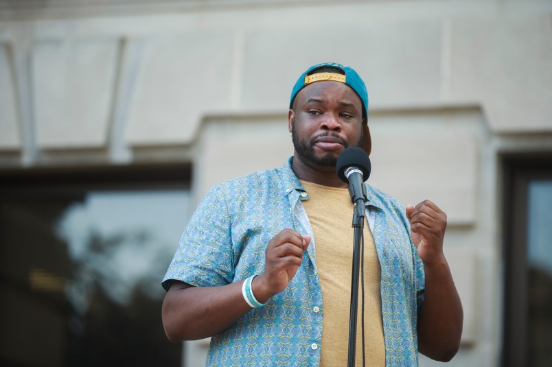 BLOOMINGTON, INDIANA, UNITED STATES - 2020/07/06: Vauhxx Booker, blue shirt, speaks during a community gathering to fight against racism.Protesters are demanding justice for Vauhxx Booker, who was allegedly attacked at Lake Monroe on Saturday the 4th of July 2020. (Photo by Jeremy Hogan/SOPA Images/LightRocket via Getty Images)