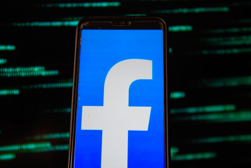 POLAND - 2020/07/15: In this photo illustration a Facebook logo is seen displayed on a smartphone with an European Union flag background. (Photo Illustration by Omar Marques/SOPA Images/LightRocket via Getty Images)