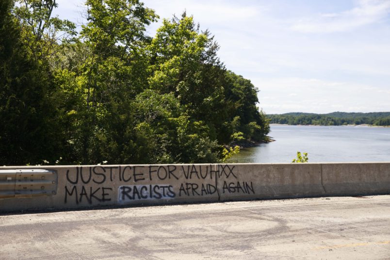 BLOOMINGTON, INDIANA, UNITED STATES - 2020/07/14: Graffiti saying Justice for Vauhxx, Make racists afraid again seen on the causeway near the McCord property where Vauhxx Booker was assaulted on the 4th of July at Monroe Lake.The Indiana Department of Natural Resources released its investigation into a July 4th incident and recommended charges against several, including Booker. Booker, who is Black, says he was the victim of an attempted lynching. (Photo by Jeremy Hogan/SOPA Images/LightRocket via Getty Images)