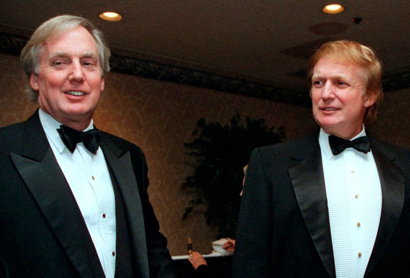 FILE - In this Nov. 3, 1999 file photo, Robert Trump, left, joins real estate developer and presidential hopeful Donald Trump at an event in New York. A tell-all book by President Donald Trump's niece cannot be published until a judge decides the merits of claims by the president's brother, her uncle Robert Trump, that its publication would violate a pact among family members, a judge said Tuesday, June 30, 2020. (AP Photo/Diane Bonadreff, File)