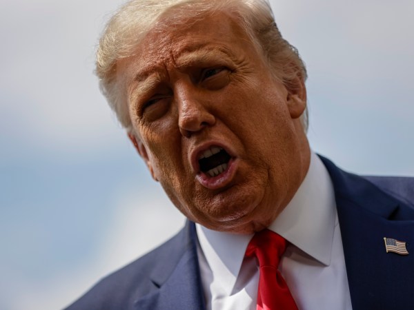 WASHINGTON, DC - AUGUST 06: President Donald Trump stops to talk to reporters as he departs the White House for a trip to Ohio where he will visit a Whirlpool factory on August 6, 2020 in Washington, DC. After the visit to the factory he will attend a fundraising reception and then head to his properties in New Jersey for the weekend. (Photo by Samuel Corum/Getty Images) *** Local Caption *** Donald Trump