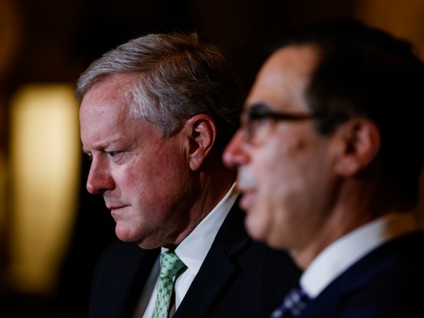WASHINGTON, DC - AUGUST 06: White House Chief of Staff Mark Meadows (L) and Treasury Secretary Steven Mnuchin (R) speak to reporters following continued negotiations with Speaker of the House Nancy Pelosi (D-CA) and Senate Minority Leader Chuck Schumer (D-NY) on a new economic relief bill in response to the coronavirus pandemic on Capitol Hill on August 6, 2020 in Washington, DC. The White House and Congressional Democrats have yet to come to an agreement on what the new relief bill will include despite the CARES Act expiring on July 31st. (Photo by Samuel Corum/Getty Images) *** Local Caption *** Steve Mnuchin; Mark Meadows