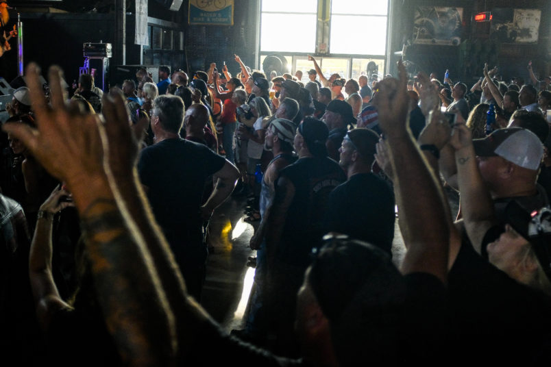 STURGIS, SD - AUGUST 07: People cheer during a concert at the Full Throttle Saloon during the 80th Annual Sturgis Motorcycle Rally on August 7, 2020 in Sturgis, South Dakota. While the rally usually attracts around 500,000 people, officials estimate that more than 250,000 people may still show up to this year's festival despite the coronavirus pandemic. (Photo by Michael Ciaglo/Getty Images)
