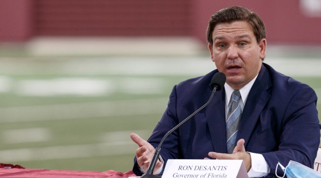 TALLAHASSEE, FL - AUGUST 11: Florida Governor Ron DeSantis speaks during a collegiate athletics roundtable about fall sports at the Albert J. Dunlap Athletic Training Facility on the campus of Florida State University on August 11, 2020 in Tallahassee, Florida. (Photo by Don Juan Moore/Getty Images) *** Local Caption *** Ron DeSantis