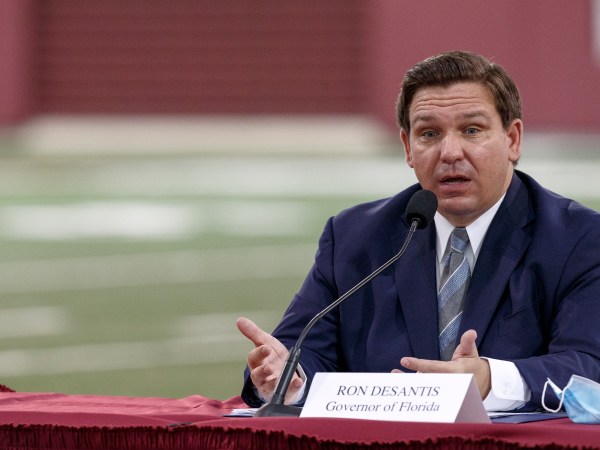 TALLAHASSEE, FL - AUGUST 11: Florida Governor Ron DeSantis speaks during a collegiate athletics roundtable about fall sports at the Albert J. Dunlap Athletic Training Facility on the campus of Florida State University on August 11, 2020 in Tallahassee, Florida. (Photo by Don Juan Moore/Getty Images) *** Local Caption *** Ron DeSantis